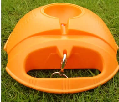 Senior tennis training equipment durable practice tool with handle and ball holder on grass.