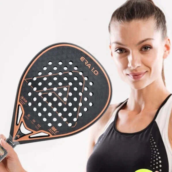 Carbon fibber tennis racket – 18K Diamond Pad racket for professionals held by a player, showcasing its design and features.