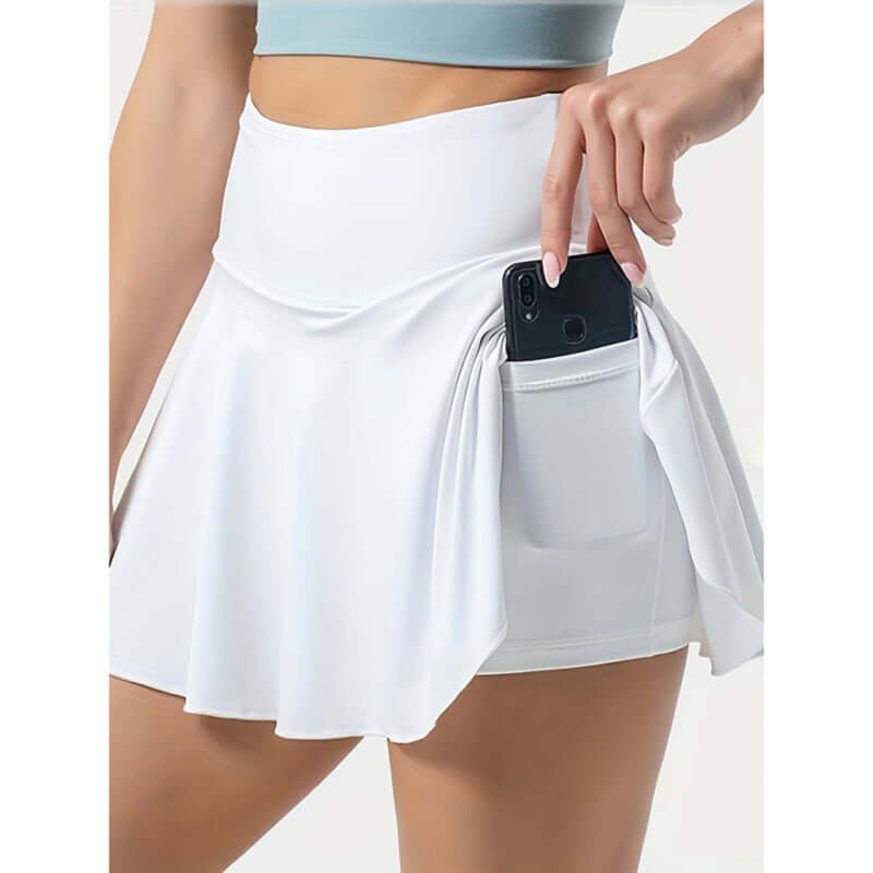 Tennis skirt – Women’s high waisted athletic skirt with pockets, featuring a pocket for phone storage.