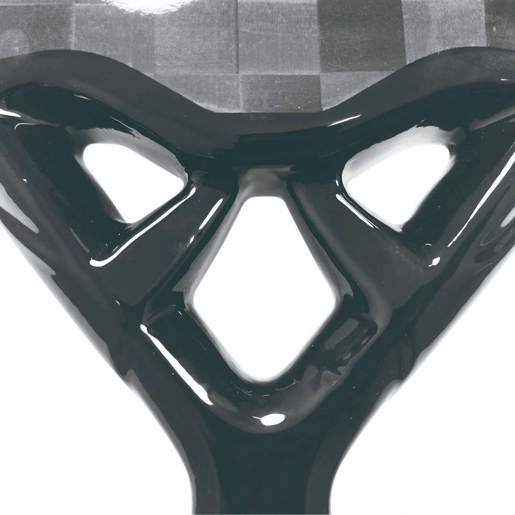 Close-up of the frame design of the best carbon fiber padel racket, showcasing its sleek aesthetics and durability.