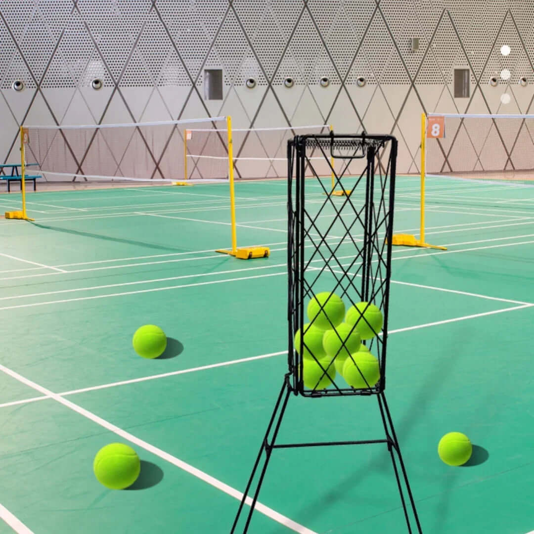 Best tennis ball collector with tennis balls in a sports hall setting, showcasing an organized collection solution.