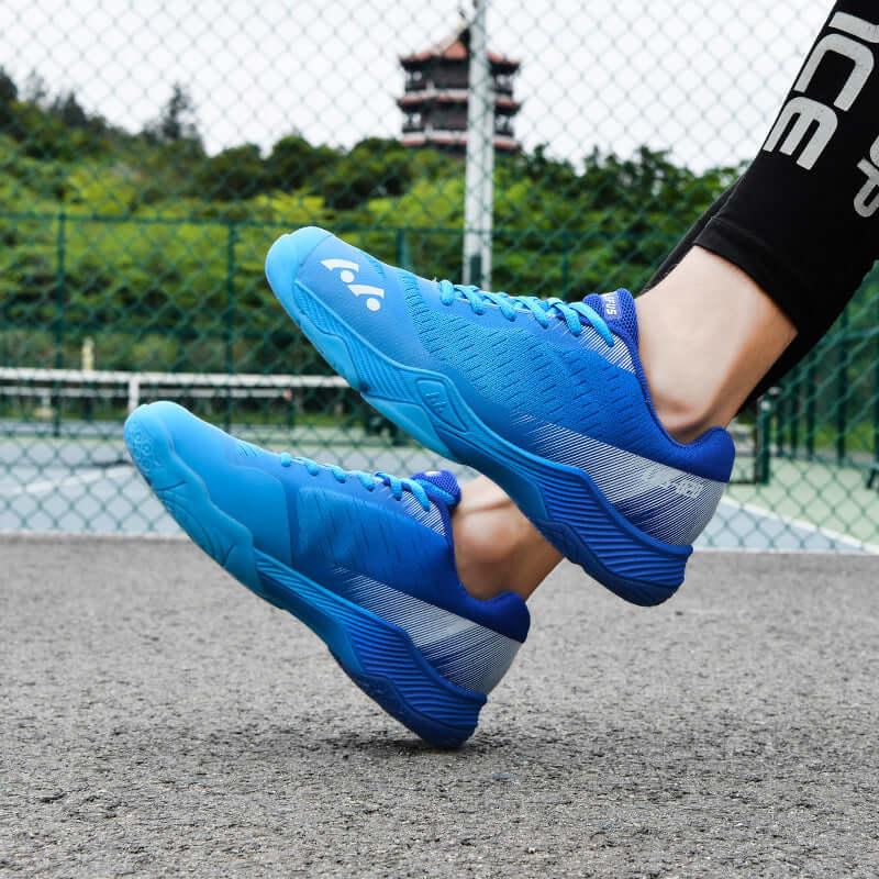 Breathable tennis shoes for men and women in blue, designed for sport and casual wear, featuring lightweight and non-slip soles.