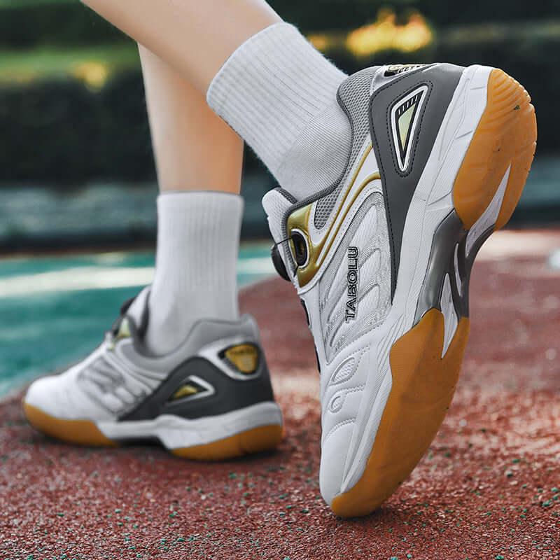 Breathable tennis shoes showcasing a lightweight design and stylish details on a tennis court.