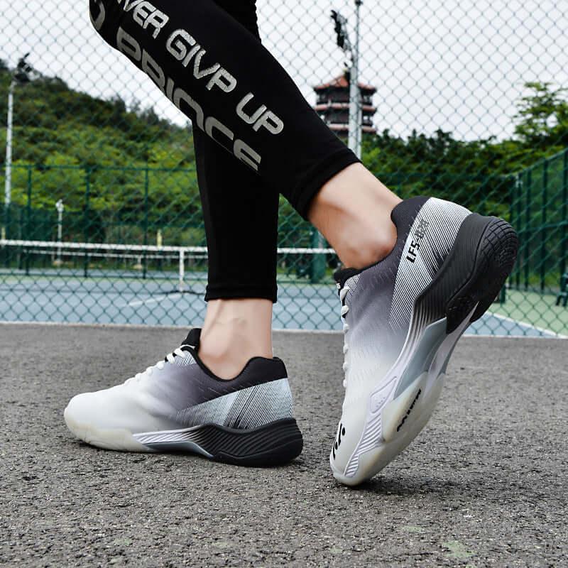 Breathable tennis shoes for men and women worn during a tennis match, designed for comfort and performance.