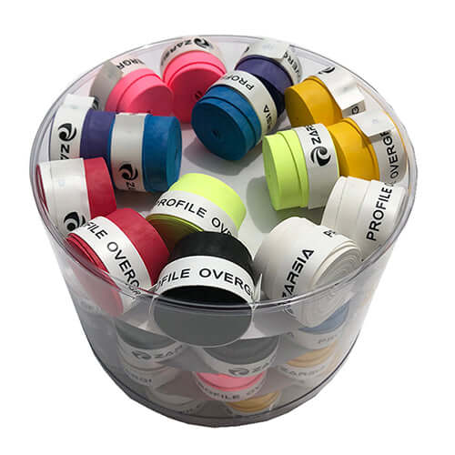 Special sweat absorbing belt for tennis racket in a clear container with various colors of tape.