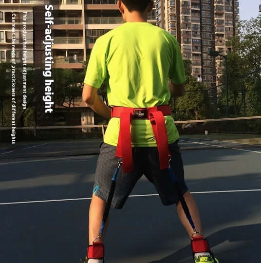 Boy using Lower Center Of Gravity Height Adjustable Tennis Balance Trainer on a tennis court for training.