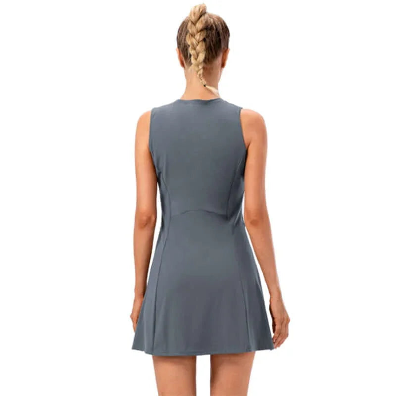 A stylish ladies tennis dress in grey, perfect for yoga, tennis, and activewear.