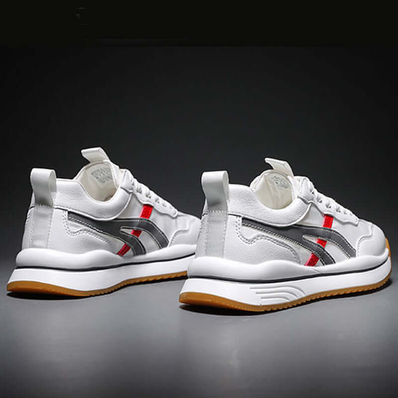 Tennis sneakers for men with high-quality leather and supportive design, ideal for sports and casual wear.