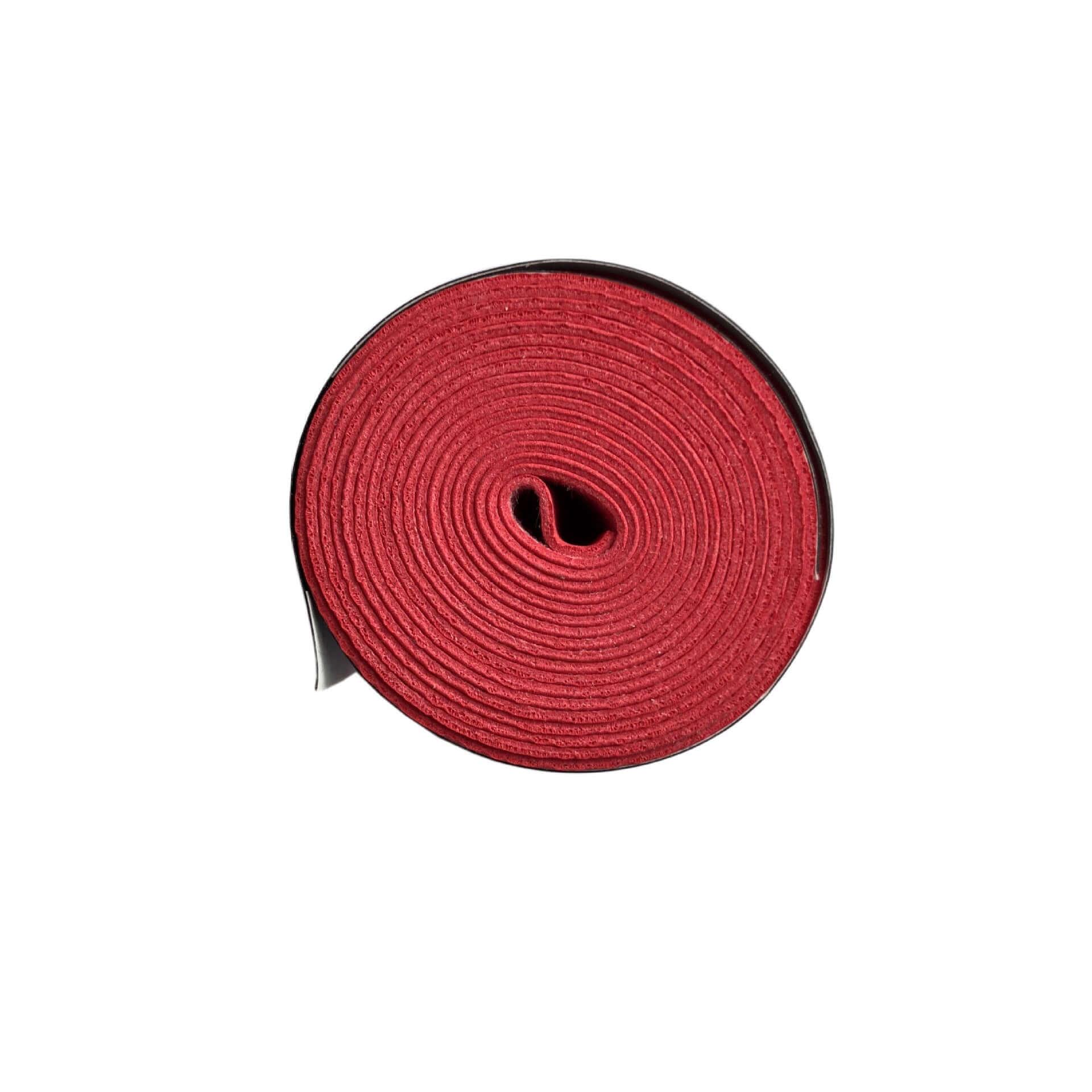 Racket Grip Tape rolled in red color, designed for optimal grip and comfort during play.