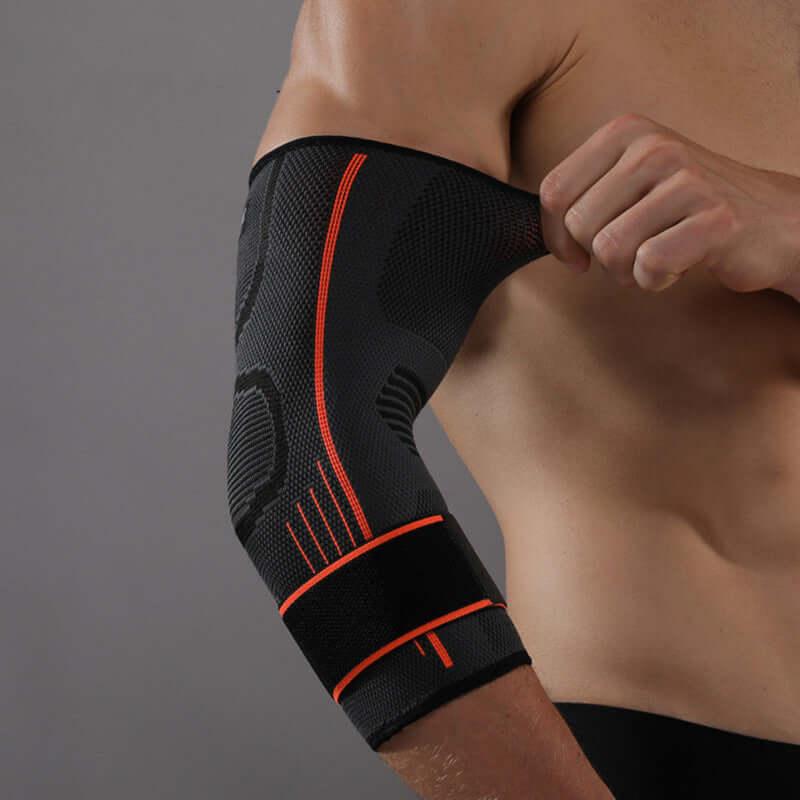 Tennis Protective Gear – Durable & Comfortable Multi-Sport Protection on an athlete's arm in black and orange.
