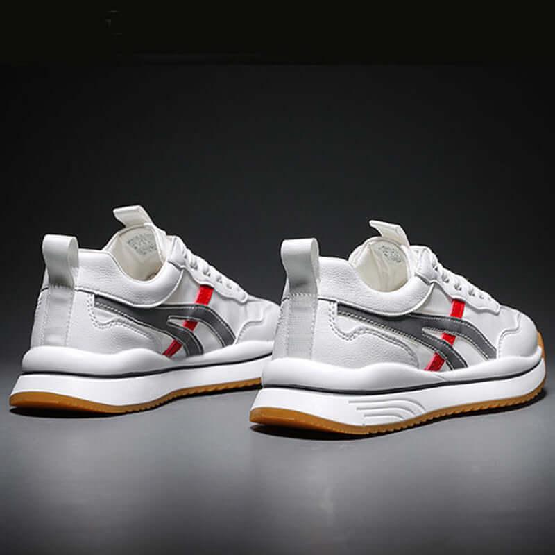 Tennis sneakers for men with high-quality leather and supportive design, ideal for sports and casual wear.