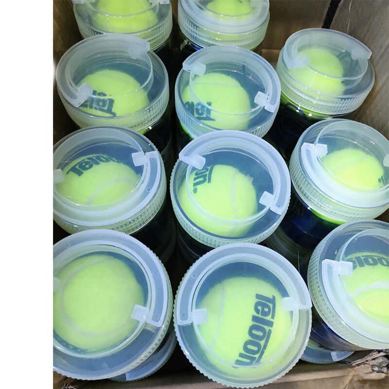 Tennis single training set balls stored in clear containers, perfect for solo practice sessions.