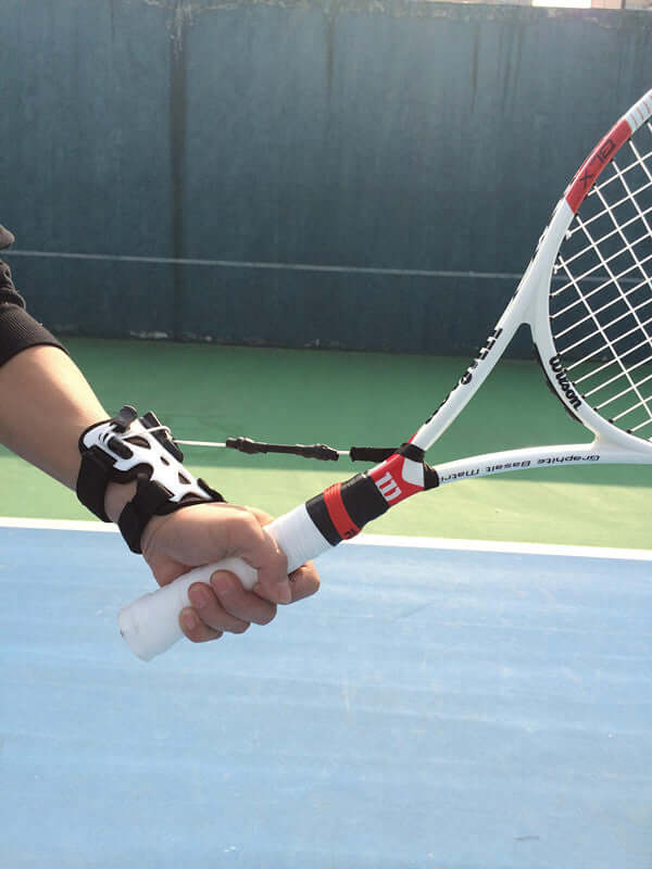 Tennis fixed wrist exerciser Wrist fixed exerciser Correct wrong wrist movements in action on the court.
