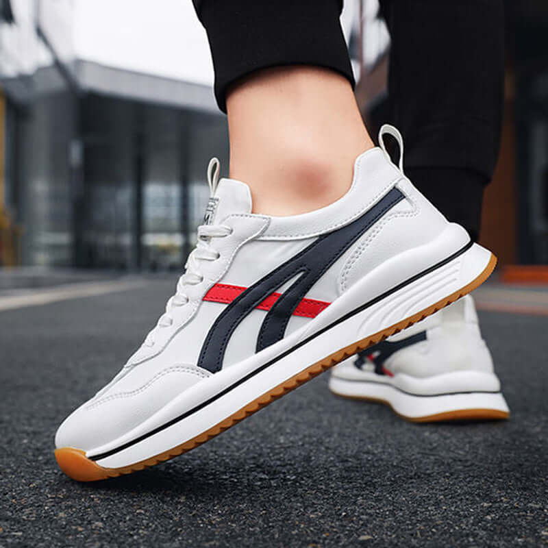 Tennis sneakers for men with high-quality leather, designed for comfort and performance in sports and casual wear.