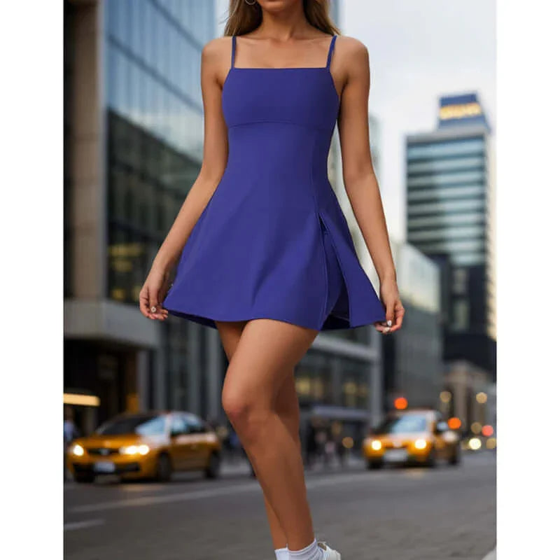 Women's tennis dress with shorts in purple, featuring a chic design and breathable fabric for comfort on the court.